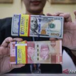 rupiah-dibuka-melemah-terhadap-dolar-as-2623313.jpg